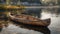 a wooden canoe resting on its side, nestled against a serene lakeside backdrop, evoking a sense of adventure and