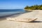 Wooden canoe on the tropical beach