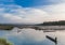 Wooden canoes crossing the river in Chitwan National Park