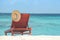 Wooden canvas chair on a beautiful tropical beach