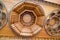 Wooden carved discs inside a luxurious Chinese style ancient building