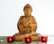 Wooden carvin buddha in meditation