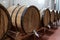 Wooden cask to make luxury alcohol drinks stand in cellar