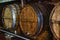 Wooden cask to make luxury alcohol drinks stand in cellar