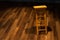 Wooden cellar with ladder and ceiling lamp inside, vintage warehouse, 3d rendering