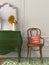 Wooden chair and green chest of drawers