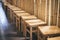 Wooden chair seats in row Japan Restaurant Shop Bamboo wall
