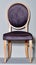 Wooden chair with a soft saddle and a round back on a gray podium and background