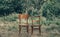 Wooden chair, wooden chair twin, Pair old wooden chair outdoors. Around the lush grass, The environment offers privacy.