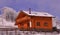 Wooden chalet in wintry view