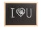 Wooden chalkboard with I love you note