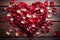 Wooden charm heart made of rose petals on a textured backdrop