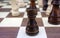 Wooden chess pawns close up