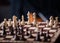 Wooden chess pieces on a chessboard