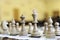 Wooden chess pieces on the table in hall