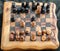 Wooden chessboard with checkmate