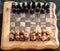 Wooden chessboard on table