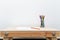 Wooden child drawing table with color pencils by the white wall