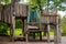 Wooden Children& x27;s Playground. Empty Modern Wooden Children Playground Set On Green Yard In Public Park In Summer Day