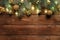 Wooden Christmas background with golden decorations, baubles, fir tree branches, garland. Christmas holiday celebration, winter,