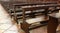 wooden Church pew bench with kneeler inside a Christian church
