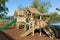 Wooden climbing frame for children in rural outdoor location