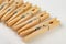 Wooden clips for attaching washed underwear on a string. Old natural home accessories