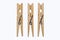 Wooden clothes pegs for hanging laundry. Household accessories