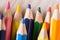 Wooden color pencils laid out on a desk