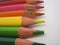 Wooden coloring pencil crayons on a white