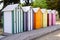 Wooden colourful beach huts with front panel girl name text