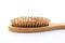 Wooden comb brush with lost hair