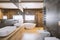 Wooden and concrete walls and white bath