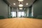 Wooden conference table and chairs in a corporate conference room