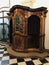 A wooden confessional of Barmherzigenkirche in Graz, Austria.