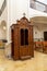 Wooden confessional inside a Christian church