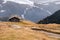 Wooden cottage in dolomities alps Italy