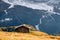 Wooden cottage in dolomities alps Italy