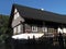 Wooden cottage, made of strong beams. Typical example of folk architecture of the Czech countryside