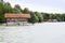 Wooden cottage on pier on the lake Ammersee in Inning am Ammersee, Germany