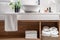 Wooden countertop with shelf for storage fresh and white terry towels