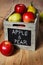 Wooden crate box full of fresh apples and pears