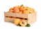 Wooden crate of delicious ripe sweet apricots isolated