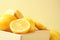 Wooden crate with fresh ripe lemons, closeup