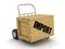 Wooden crate with Import on Hand Truck. Image with clipping path