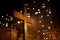 Wooden cross against block of flats