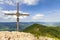 Wooden cross on the summit of a mountain Grosser Osser in National park Bavarian forest, Germany.