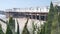 Wooden Crystal pier on piles with white cottages, California ocean beach, USA.