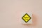 Wooden cube block with safety first icon  for work safety, caution work hazards, danger surveillance campaign, zero accident