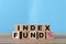 Wooden cube blocks with text INDEX FUND